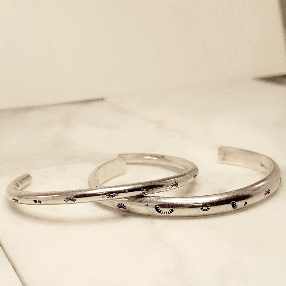 Two Vintage Stamped Sterling Bangles